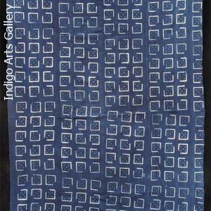 Indigo stitch-resist-dyed strip-weave cloth