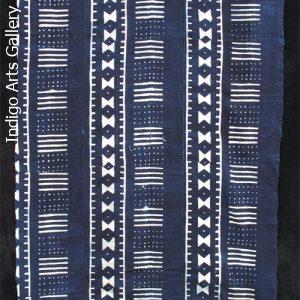 Indigo resist-dyed strip-weave cloth