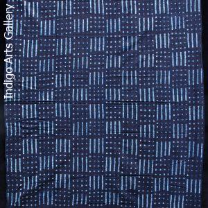 Indigo resist-dyed strip-weave cotton cloth