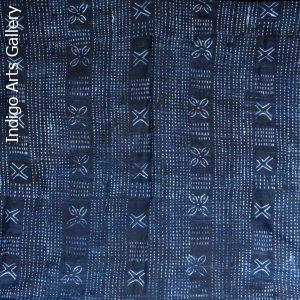 Indigo resist-dyed strip-weave cotton cloth