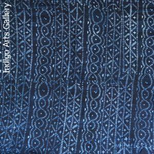 Indigo resist-dyed strip-weave cotton cloth