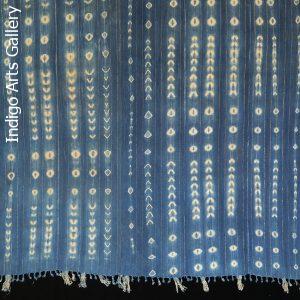 Indigo resist-dyed strip-weave cotton cloth with Lurex threads