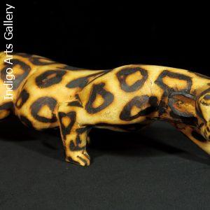 Stalking Leopard wood sculpture