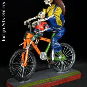 Two Calaveras on a Bike - Retablo Sculpture