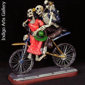 The Family that Rides Together - retablo sculpture