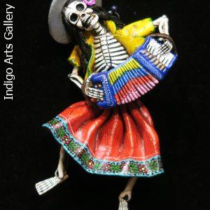 Calavera Accordionist of the Sierra - retablo sculpture