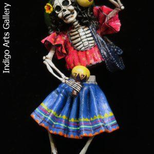 Calavera with Maracas - retablo sculpture