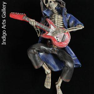 Calavera Rocker - retablo sculpture